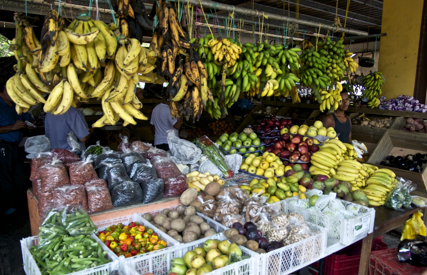 Bananas, fruit, beans and peppers at a Cayo market stall